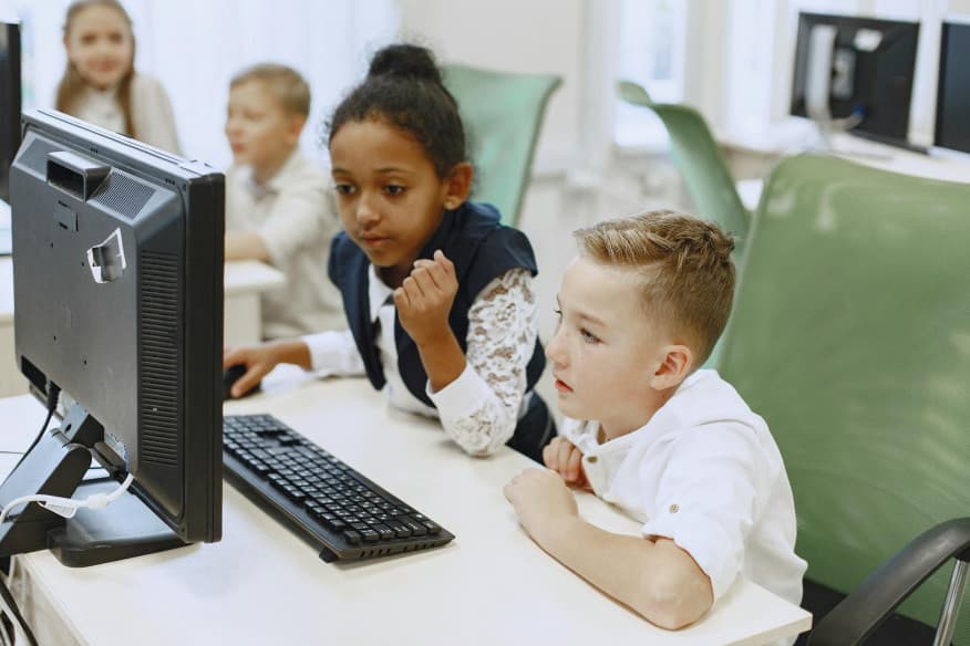 Students at Hoffman Academy using computers in class